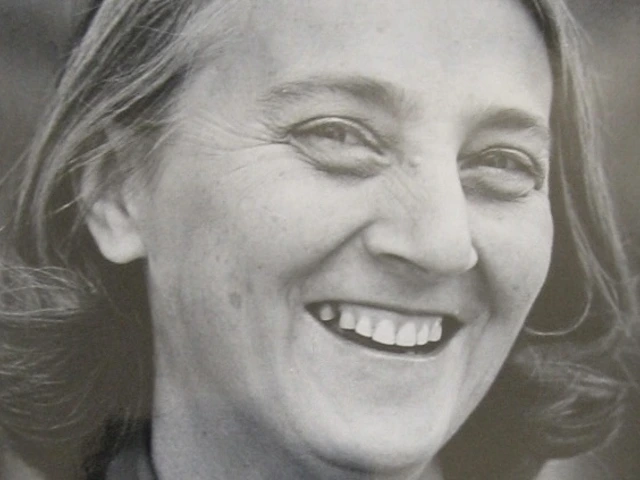 Black and white photo of a woman smiling