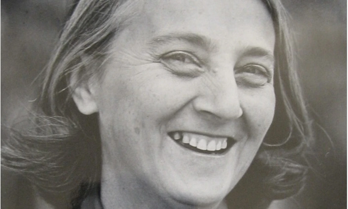 Black and white photo of a woman smiling